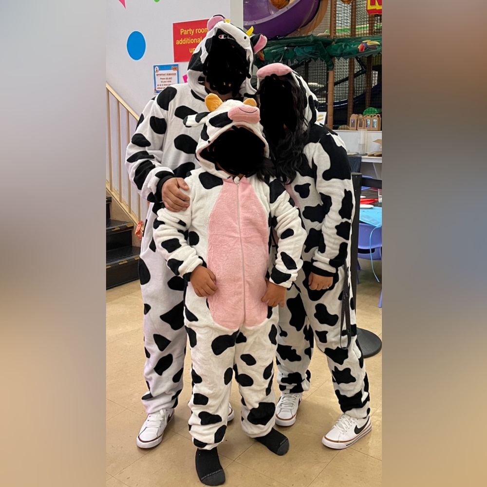 Cow costume onesie